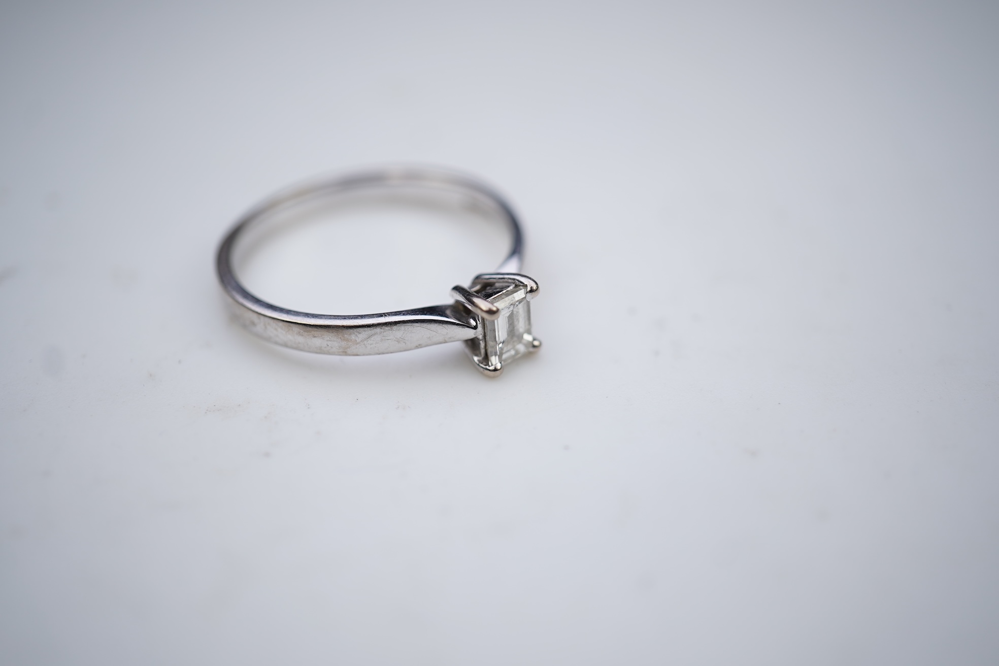 A diamond solitaire ring
